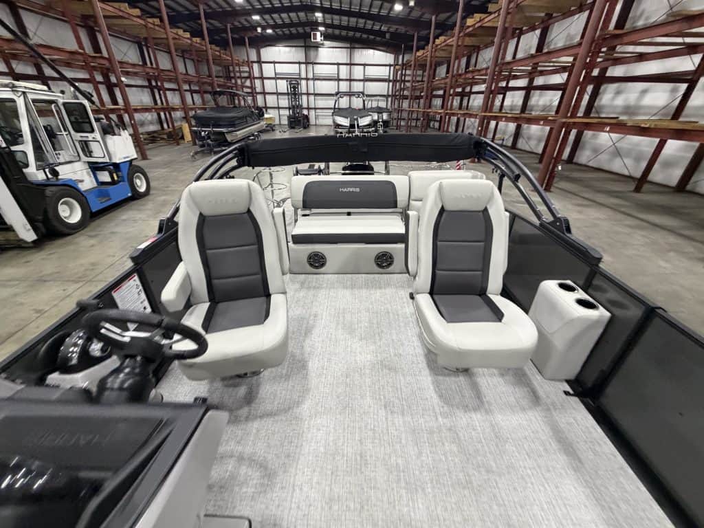 Interior view of Harris 230 SBHL pontoon boat at Hall's Sport Center.
