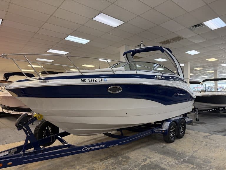 Crownline 270CR boat on trailer inside showroom.