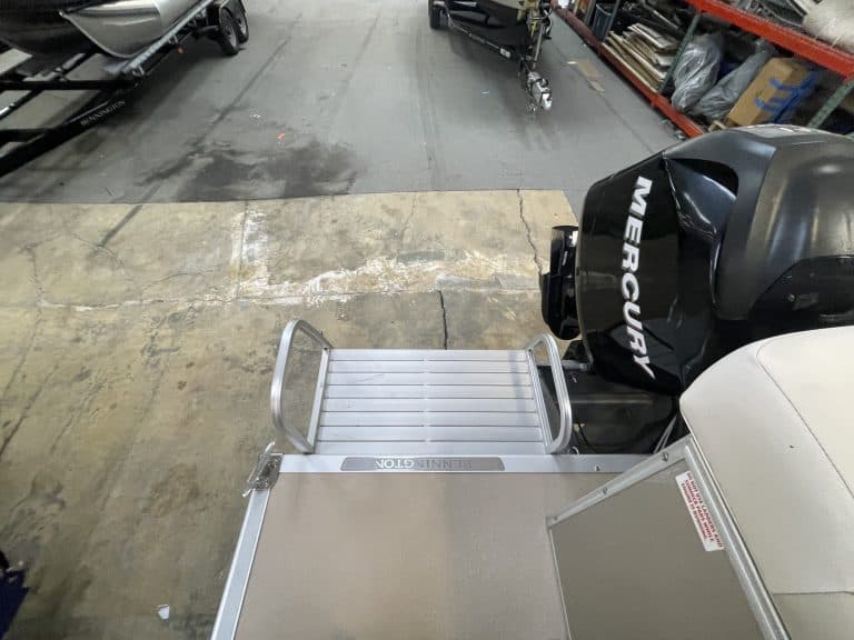Bennington 2275 RL boat with Mercury outboard motor at Hall's Sport Center.