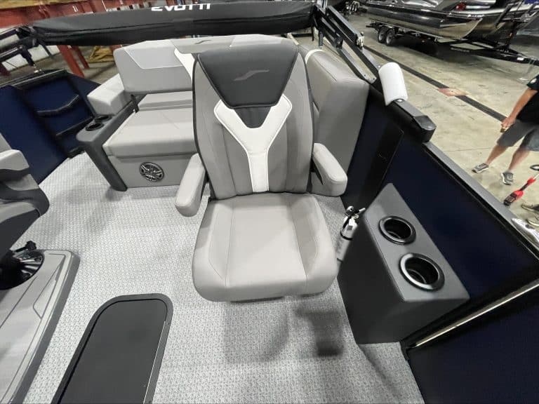 Luxury boat captain seat with armrests and cup holders at Hall's Sport Center.