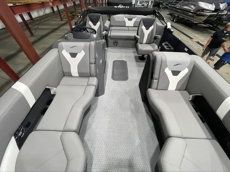 Modern boat interior with spacious seating at Hall's Sport Center.