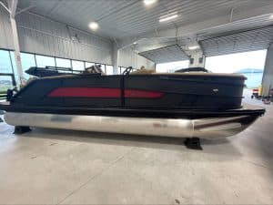 Luxury pontoon boat at Hall's Sport Center with sleek design and modern features.