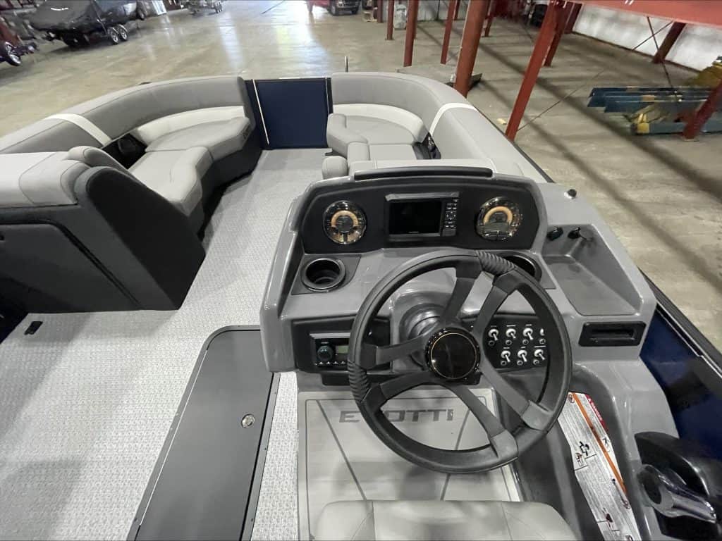 Interior view of the 2027 EVOTTI 521CS pontoon boat at Hall's Sport Center.