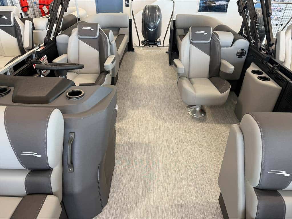 Bennington 22 S1SR boat interior with seating and steering area.