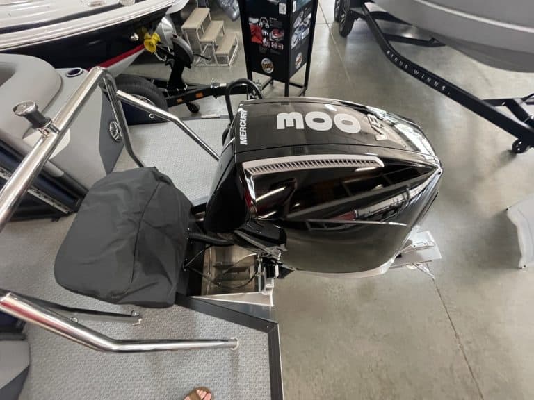 Outboard motor for boat at Hall's Sport Center.