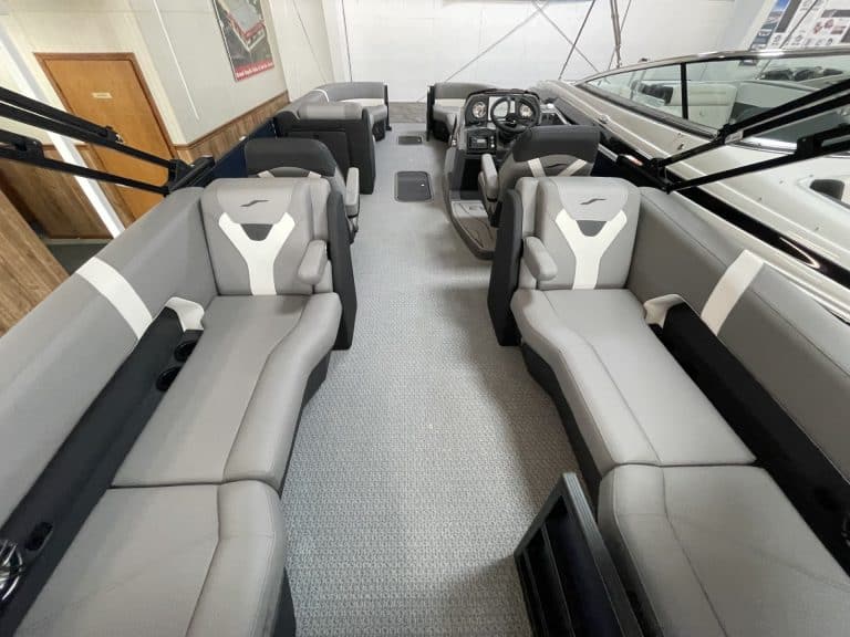 Luxury boat interior with spacious seating and modern controls at Hall's Sport Center.