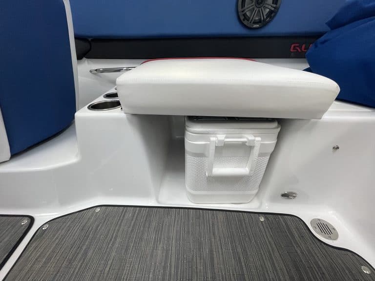 Close-up of boat seating and storage compartment on a Glastron GX215.