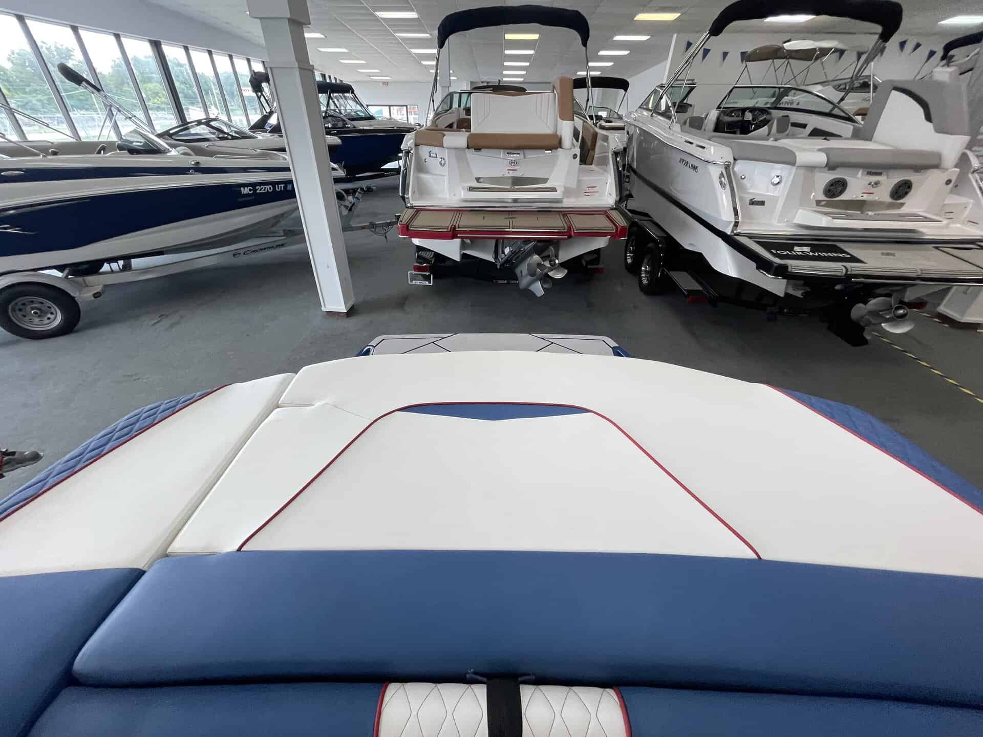 View of Glastron GX215 boat in showroom at Hall's Sport Center.