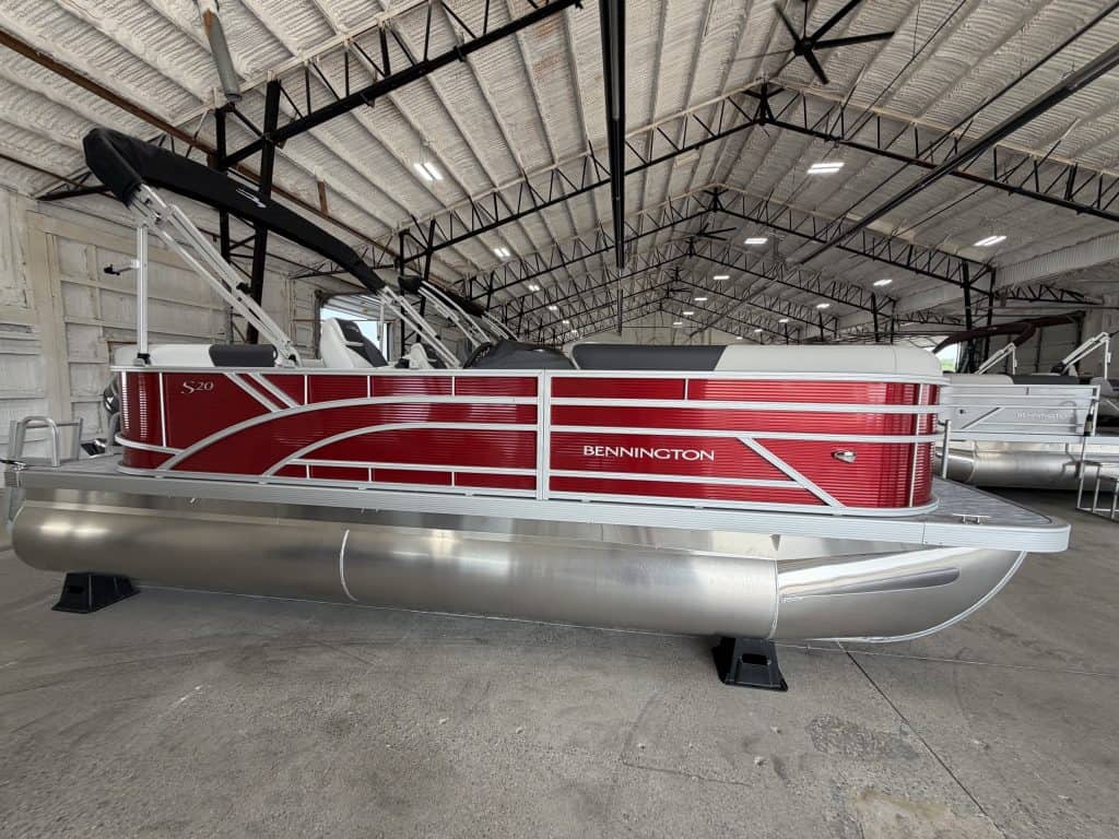 Bennington 20 S1SR pontoon boat inside Hall's Sport Center.