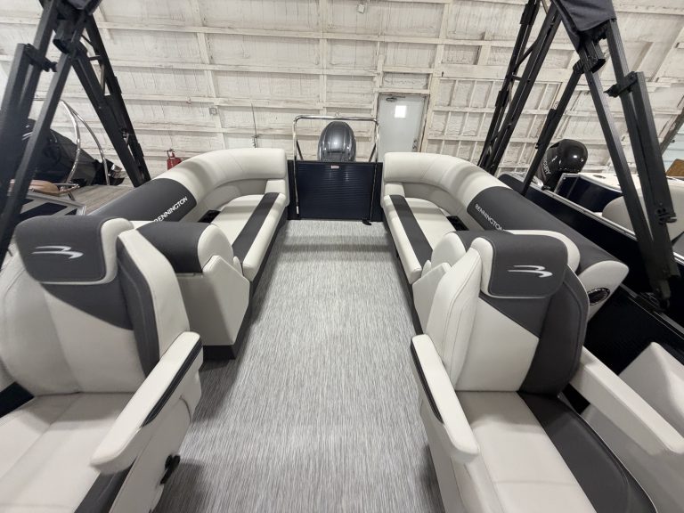 Luxury boat seating area at Hall's Sport Center with comfortable cushioned seats.