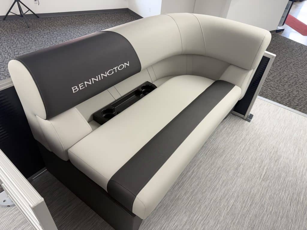 Comfortable Bennington boat seating with logo at Hall's Sport Center.