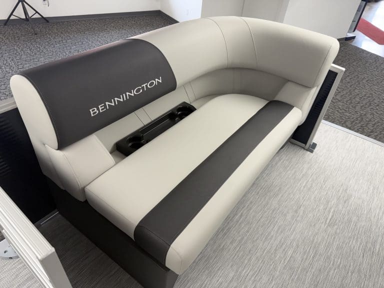 Comfortable Bennington boat seating with logo at Hall's Sport Center.