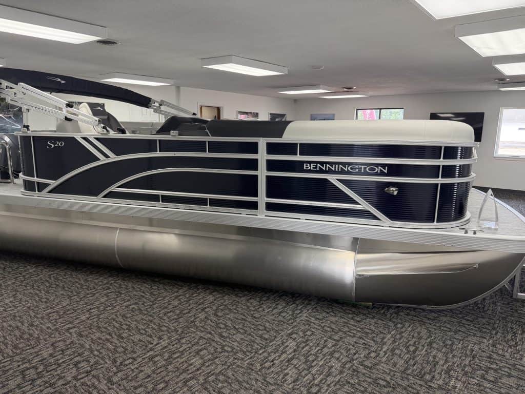 Bennington 20SL S1 pontoon boat displayed indoors at Hall's Sport Center.