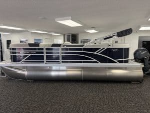 Bennington 20SL S1 pontoon boat displayed indoors at Hall's Sport Center.