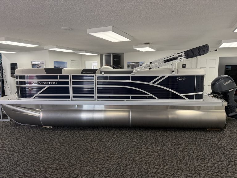 Bennington 20SL S1 pontoon boat displayed indoors at Hall's Sport Center.