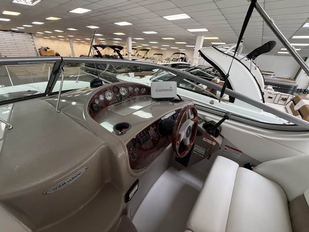 Interior view of a 2004 Four Winns 268 VISTA boat at Hall's Sport Center.