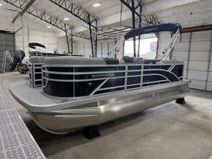 Bennington 20S1 SL pontoon boat inside a warehouse.