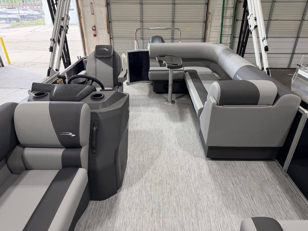 Boat seating area with modern gray and black seats at Hall's Sport Center.