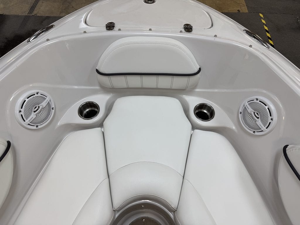 Close-up of the bow seating and speakers on a Four Winns 220 Horizon boat.
