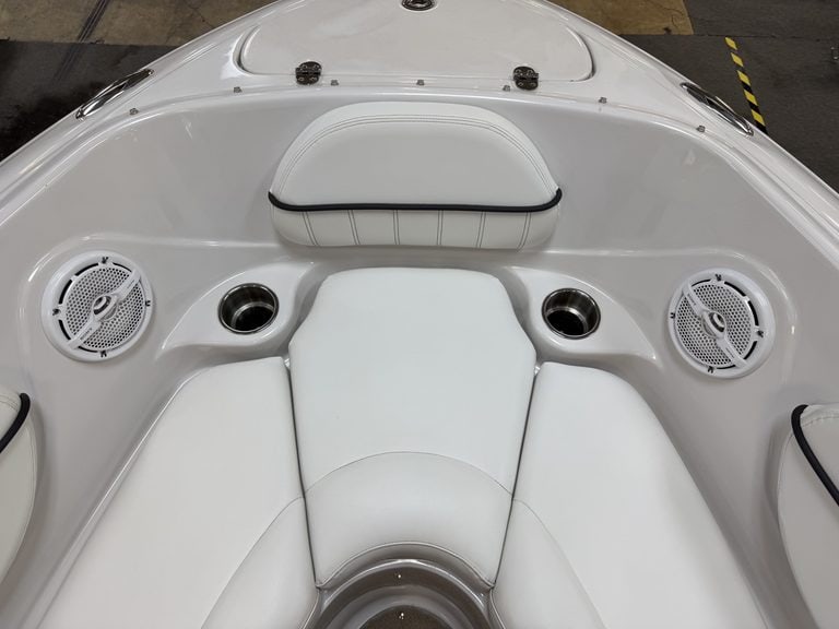 Close-up of the bow seating and speakers on a Four Winns 220 Horizon boat.