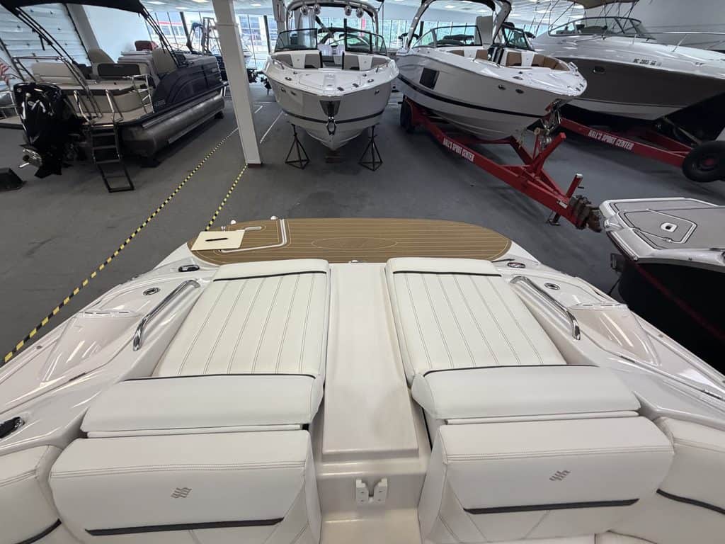 Luxury boat with white seating at Hall's Sport Center.
