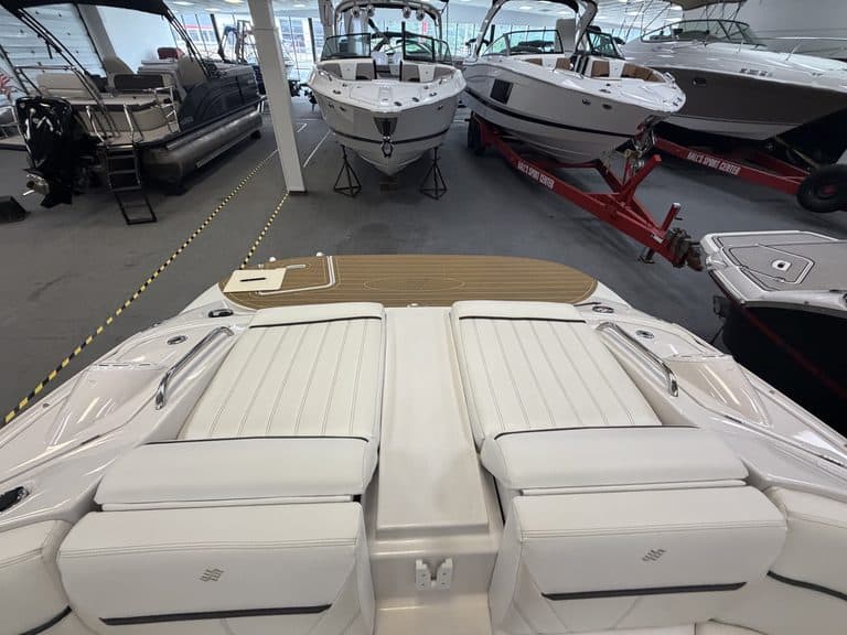 Luxury boat with white seating at Hall's Sport Center.