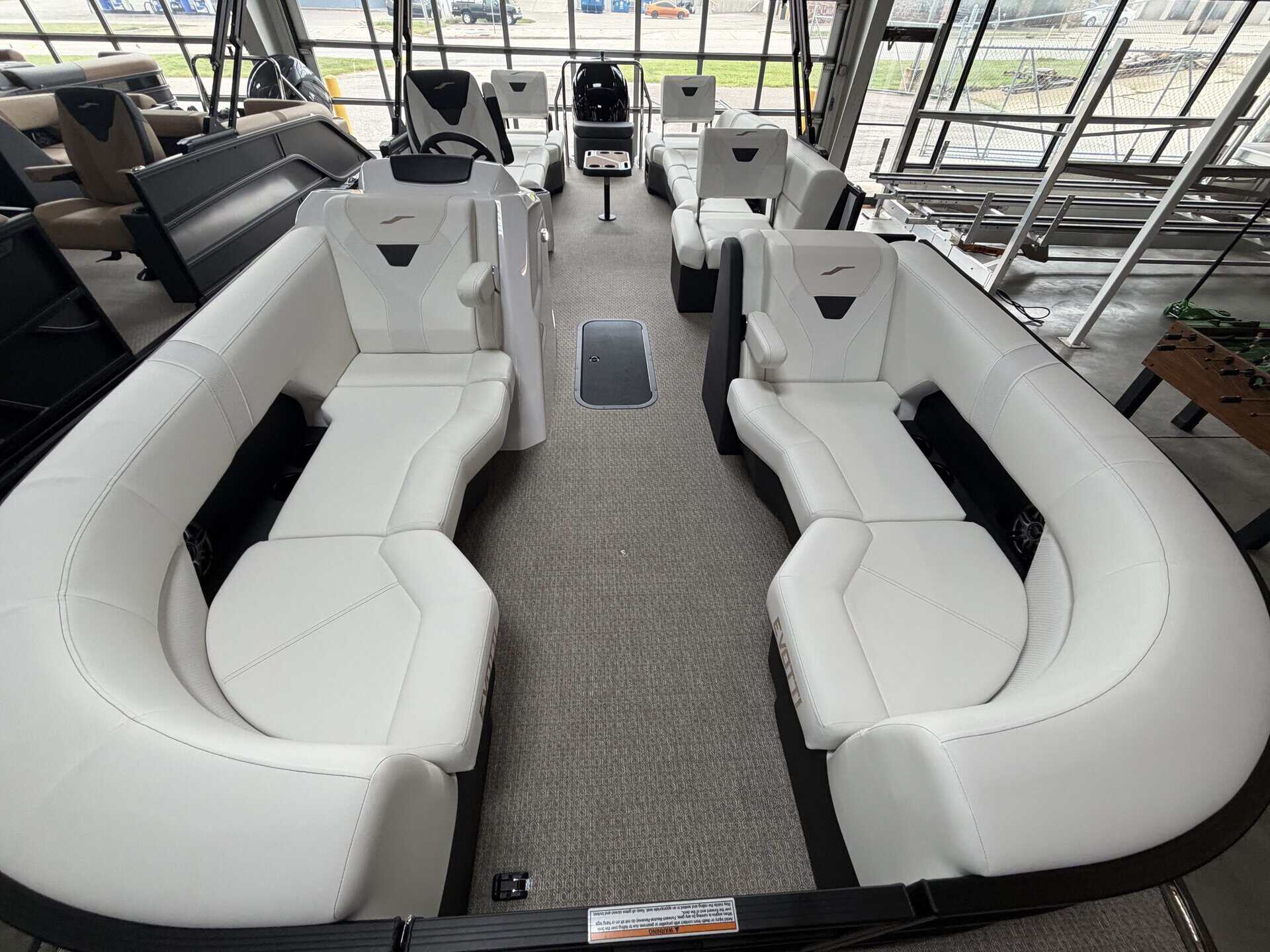 White luxury boat seats with modern design at Hall's Sport Center.