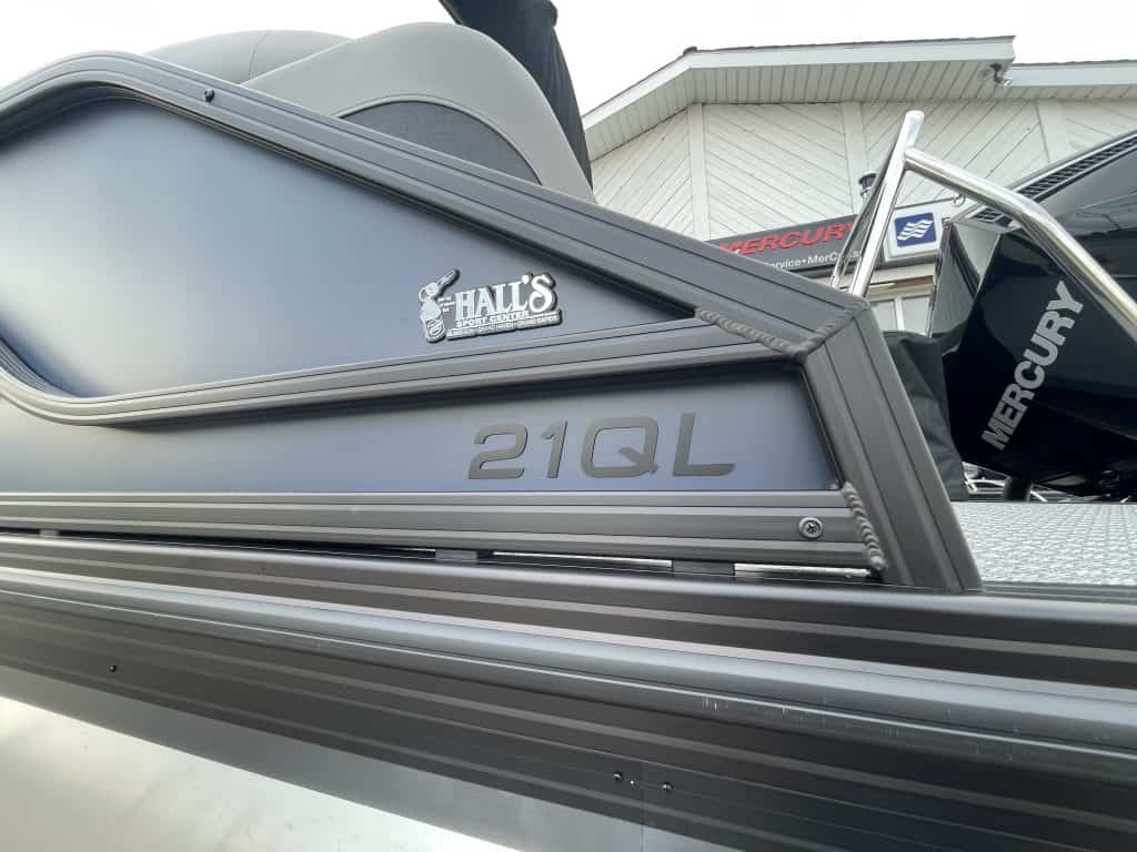Mercury 21QL boat at Hall's Sport Center for fishing and water sports.
