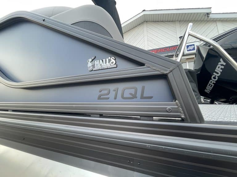 Mercury 21QL boat at Hall's Sport Center for fishing and water sports.