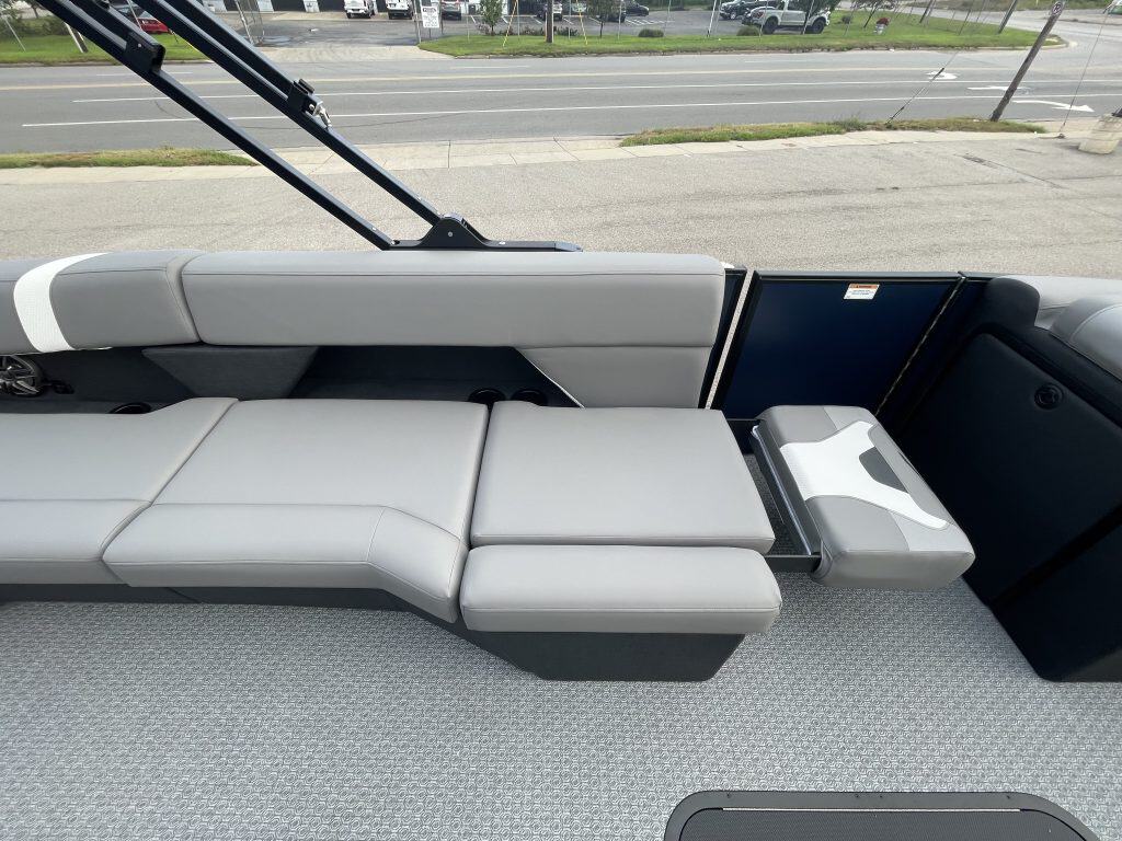 Boat interior with seating and dashboard at Hall's Sport Center.