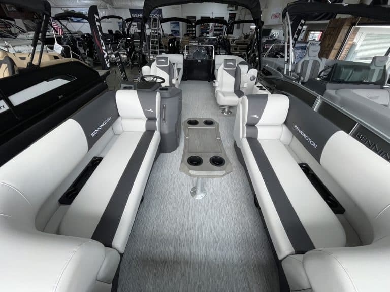 Bennington 22 S1SR pontoon boat interior with seating and steering console.