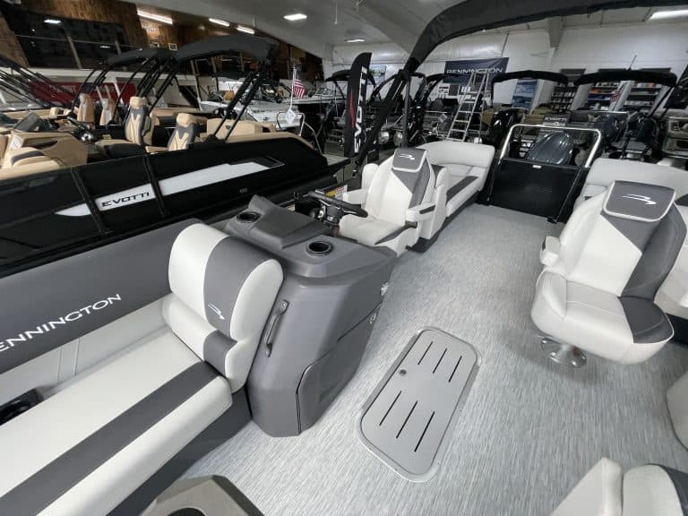 Bennington 22 S1SR pontoon boat interior with seating and steering console.