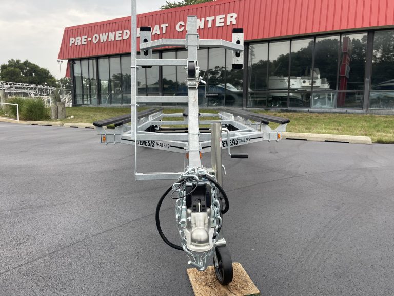 Genesis PF22T boat trailer parked outside Hall's Sport Center.