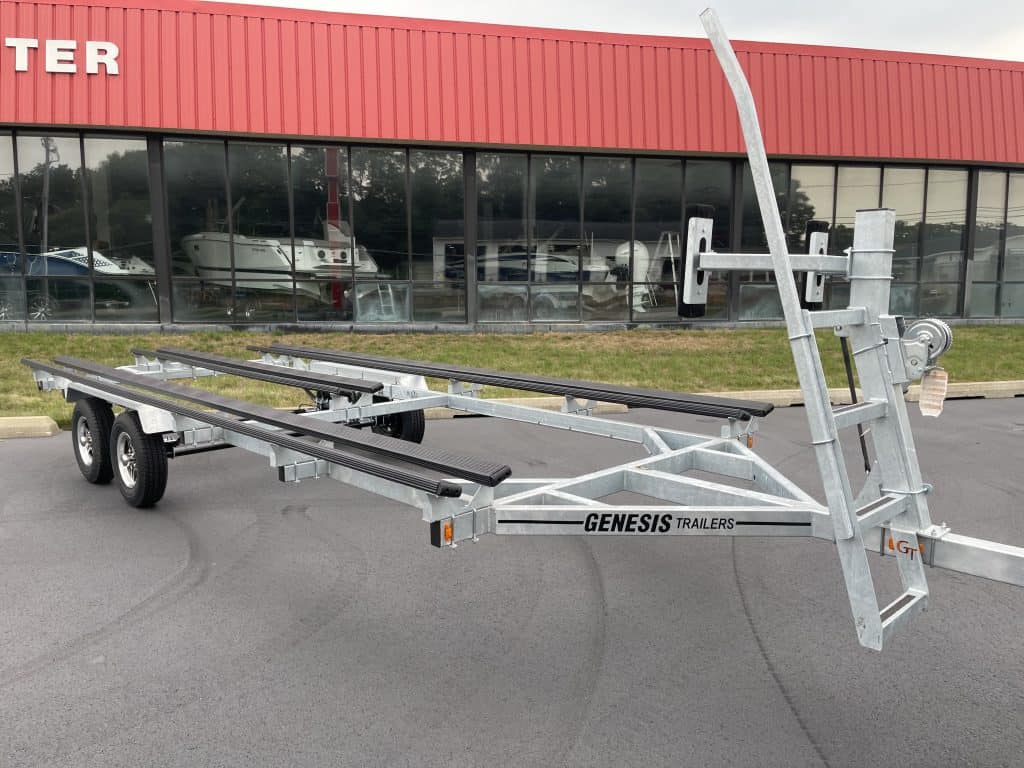 Genesis PF22T boat trailer parked outside Hall's Sport Center.