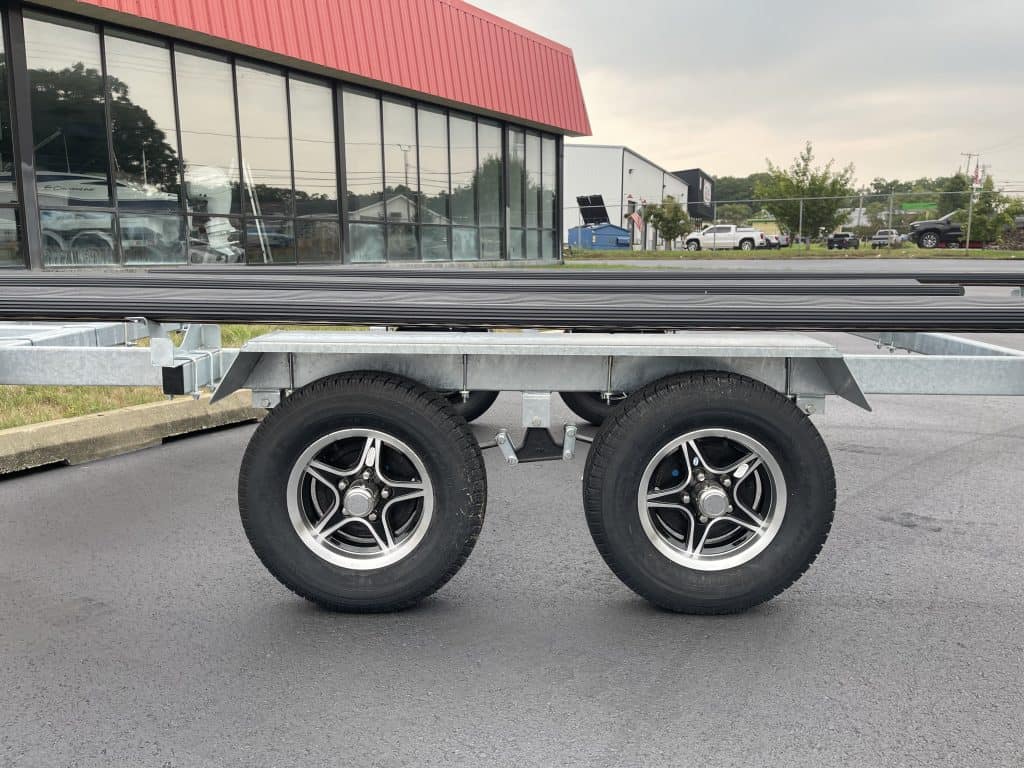 Close-up of trailer wheels at Hall's Sport Center parking lot.