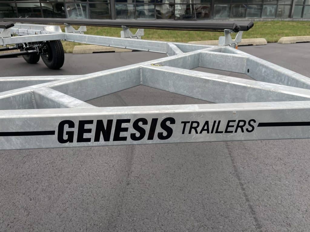 Metal Genesis trailers parked outside Hall's Sport Center for sports equipment transport.