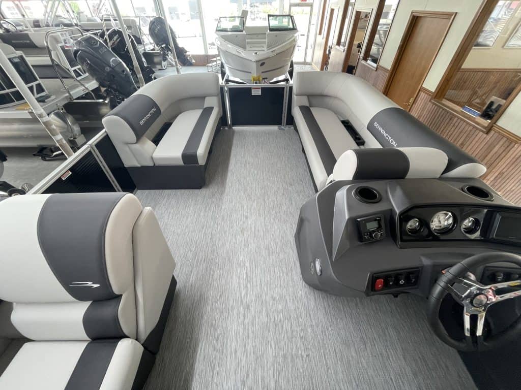 Bennington 20 S1L pontoon boat interior with seating and steering console.
