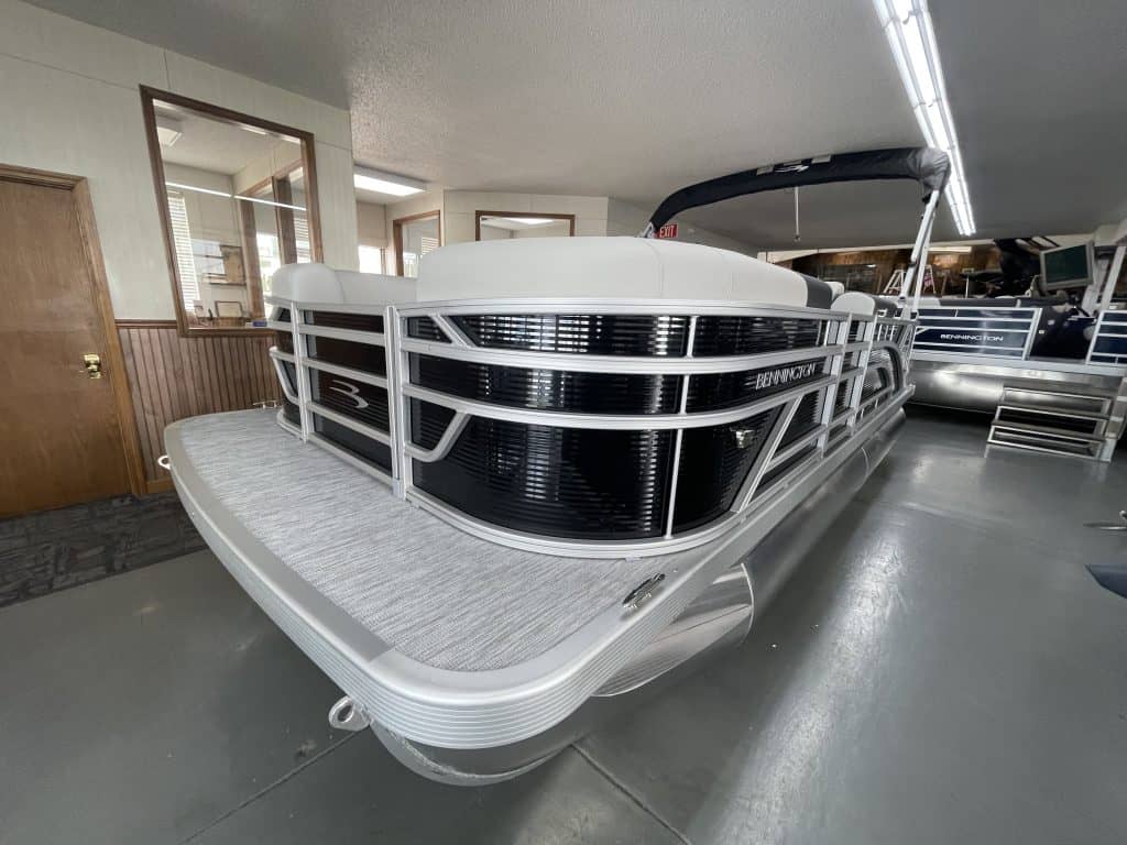 Bennington 20 S1L pontoon boat inside Hall's Sport Center.