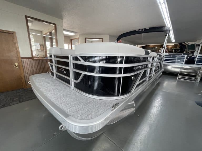 Bennington 20 S1L pontoon boat inside Hall's Sport Center.