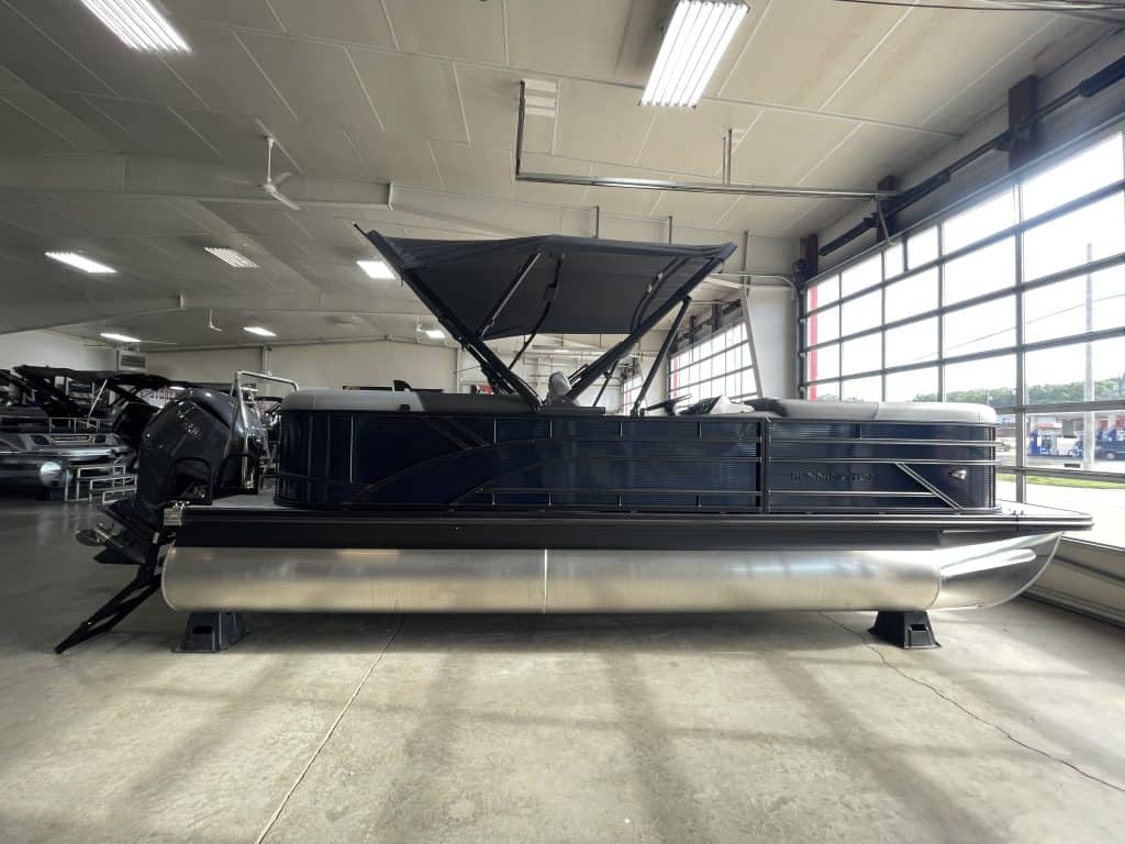 Bennington 22S1 SSR pontoon boat inside Hall's Sport Center.