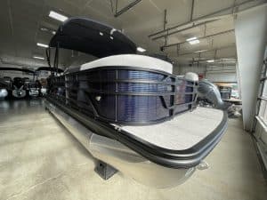 Bennington 22S1 SSR pontoon boat displayed indoors at Hall's Sport Center.