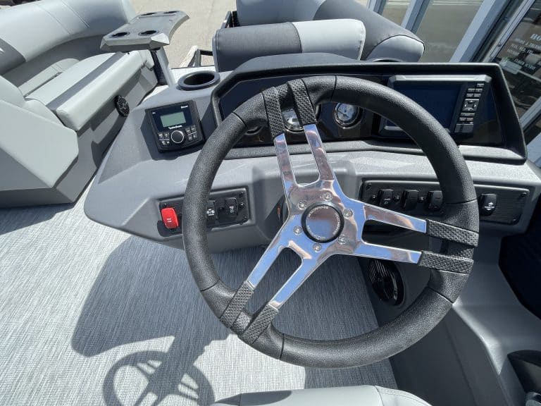 Bus steering wheel and dashboard at Hall's Sport Center.