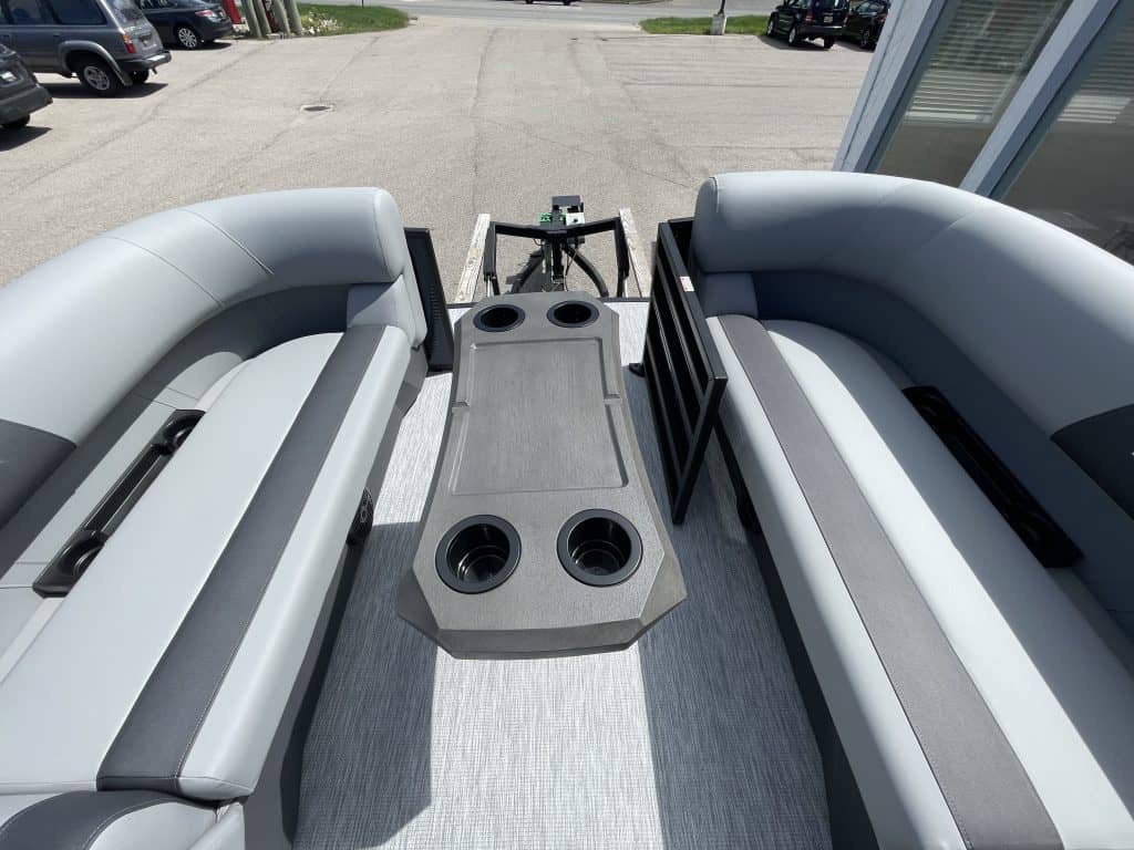 Bennington 22S1 SSR pontoon boat with seating and cup holders.
