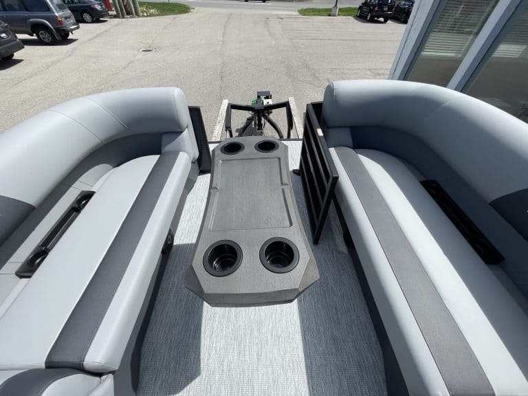 Bennington 22S1 SSR pontoon boat with seating and cup holders.
