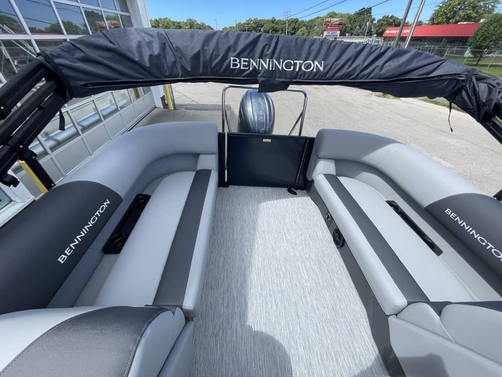 Bennington pontoon boat with seating at Hall's Sport Center.