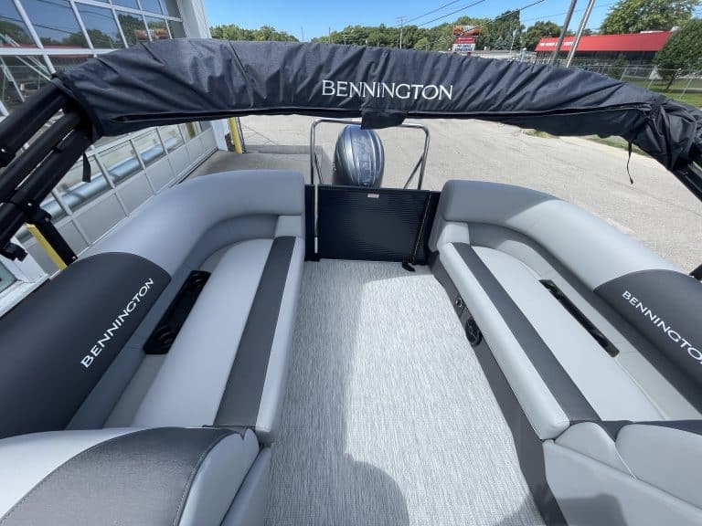 Bennington pontoon boat with seating at Hall's Sport Center.