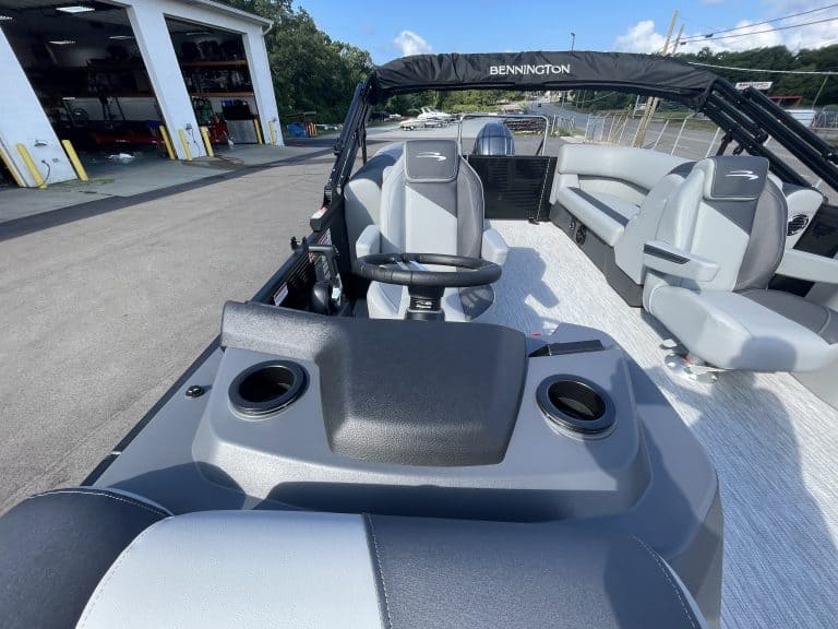 Bennington 22S1 SSR pontoon boat with seating and steering wheel.