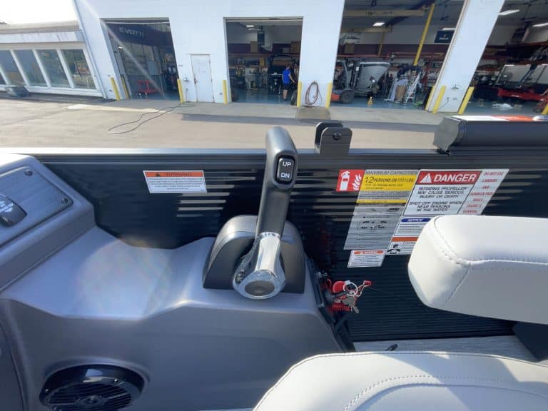 Boat control panel with throttle and safety features at Hall's Sport Center.