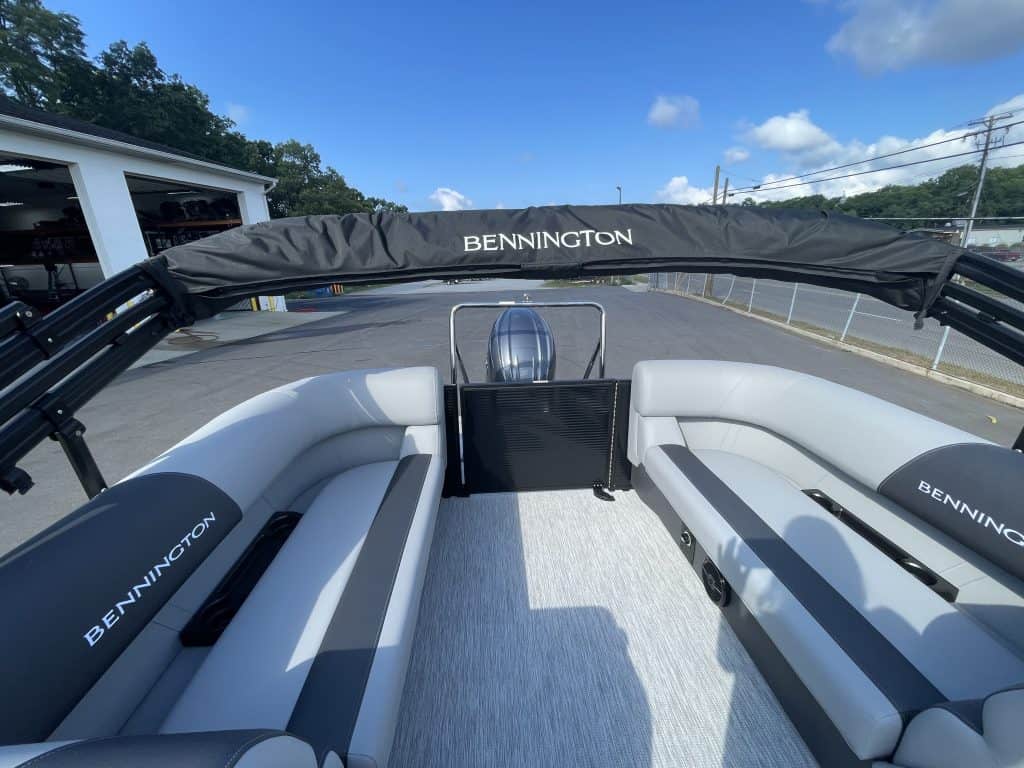 Bennington pontoon boat with seating at Hall's Sport Center.