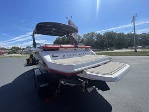 Luxury 2022 Four Winns H2 boat with swim platform and canopy.